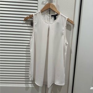 White Sleeveless Blouse with High Neckline